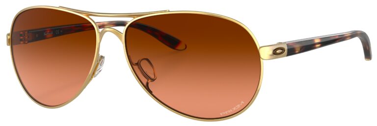 Oakley Feedback Sunglasses in a Polished Gold frame with Prizm Brown Gradient Lens. Angled left